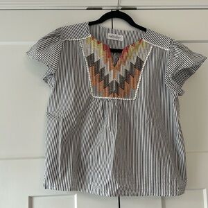 Black and white striped top with multicolor embroidery
